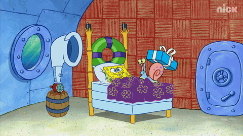 Spongebob Squarepants and Gary the Snail are jumping out of a bed. Balloons are released and confetti goes everywhere. Spongebob is swinging a party favor and blowing into a party horn. Gary has a present on the back of their snail. 