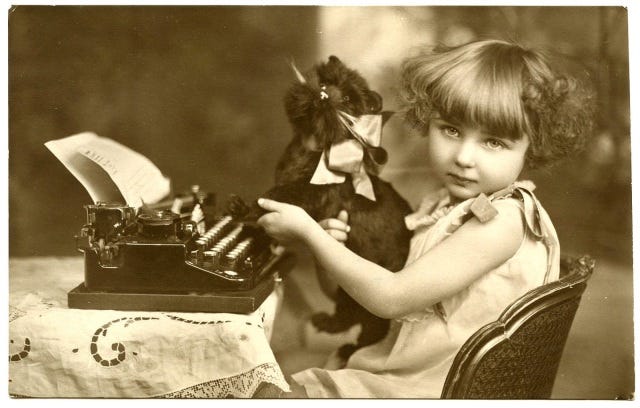 little girl typing