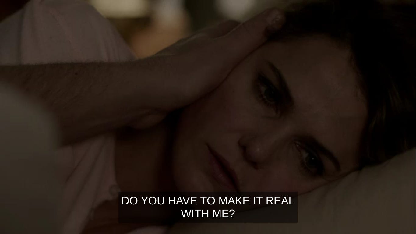 Elizabeth lying in bed saying "Do you have to make it real with me?"