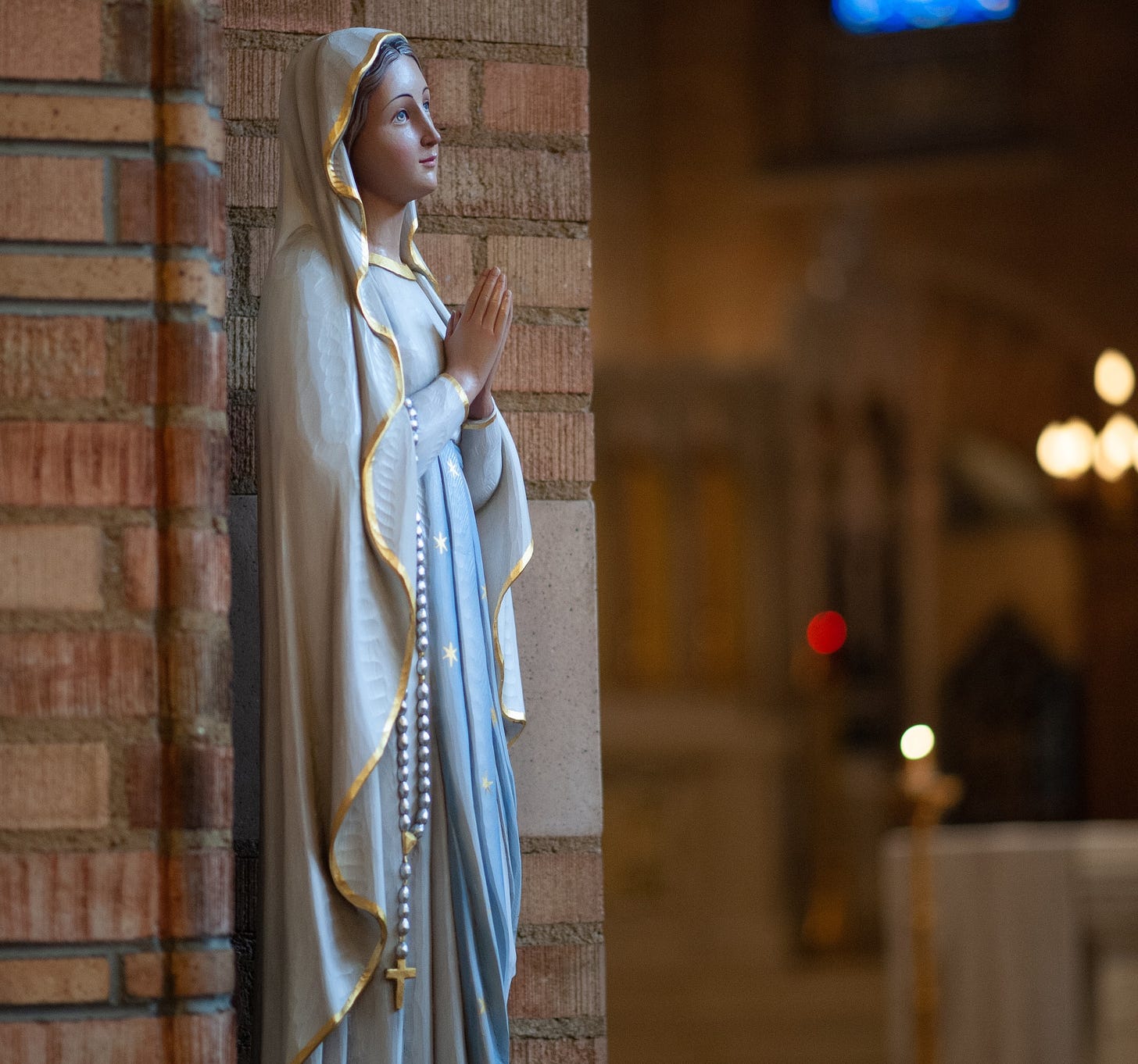 Blessed Mother praying statue