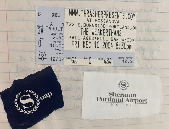 A ticket stuck for the Weakerthans, 2004, and a piece of a Sheraton soap wrapper