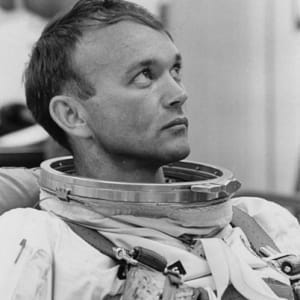 Photo of Michael Collins in spacesuit