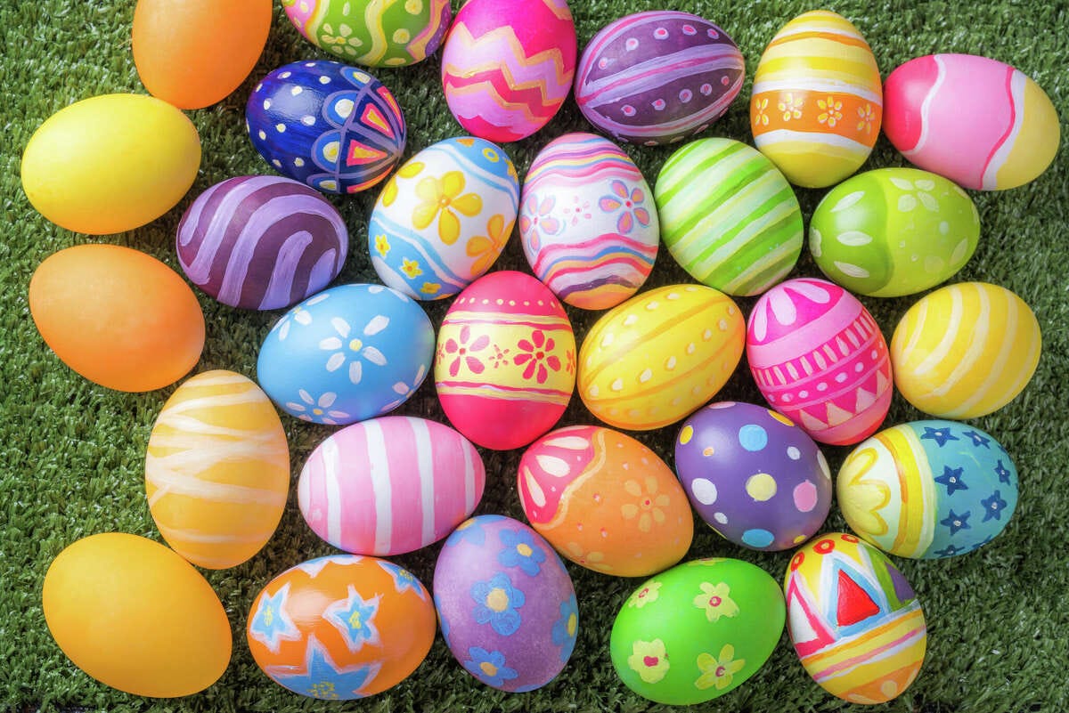 Photo of assorted dyed easter eggs with patterns and bright colors