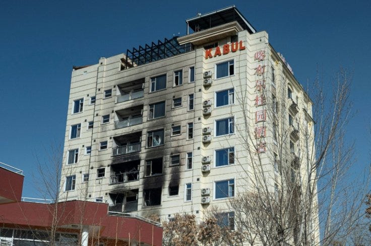 Beijing 'Shocked' By Attack On Afghan Hotel Hosting Chinese Visitors
