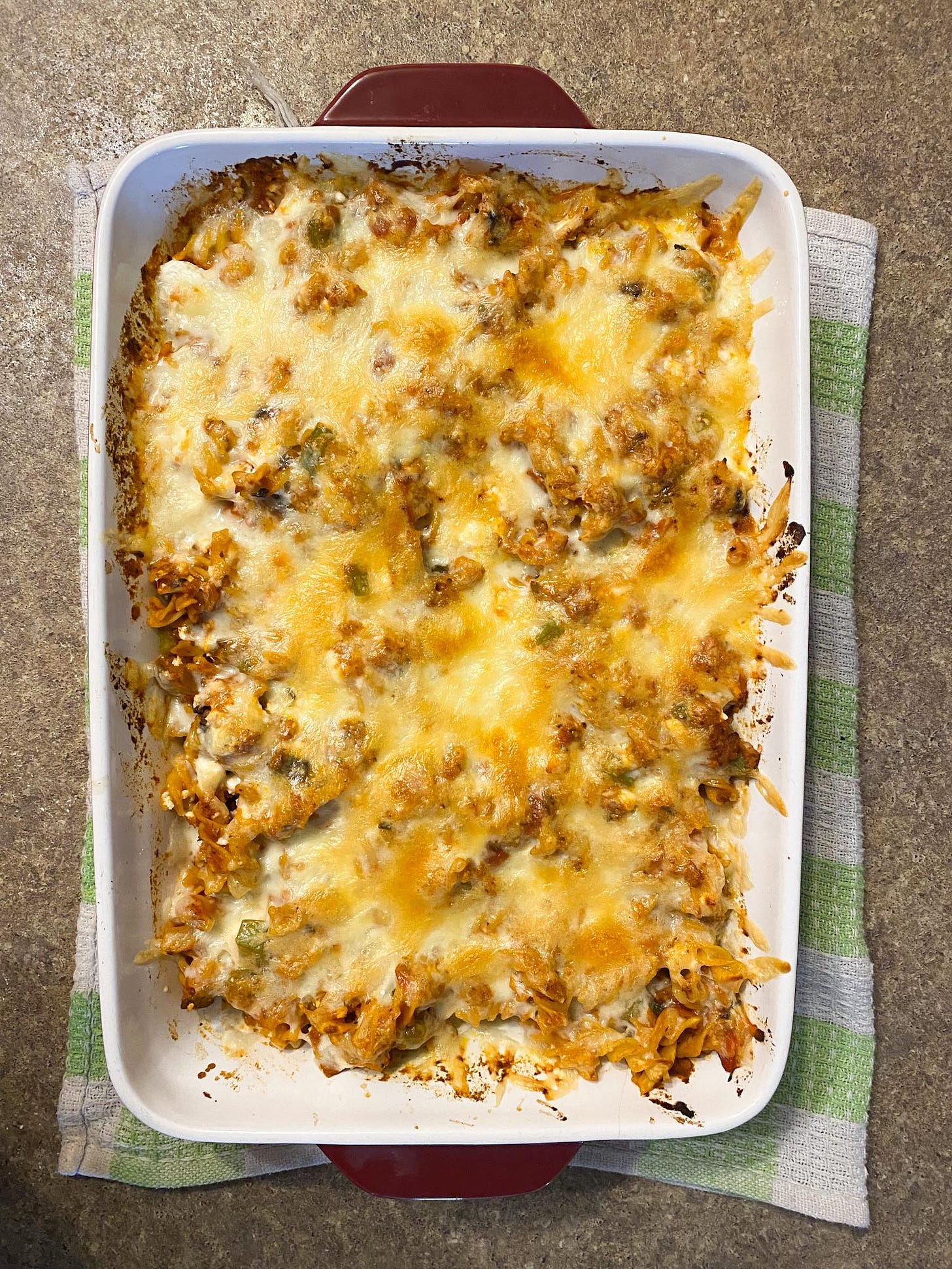pasta in a casserole dish, the cheese golden from being broiled