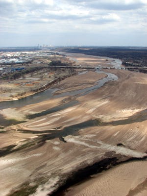 Braided sand and water define a prairie river