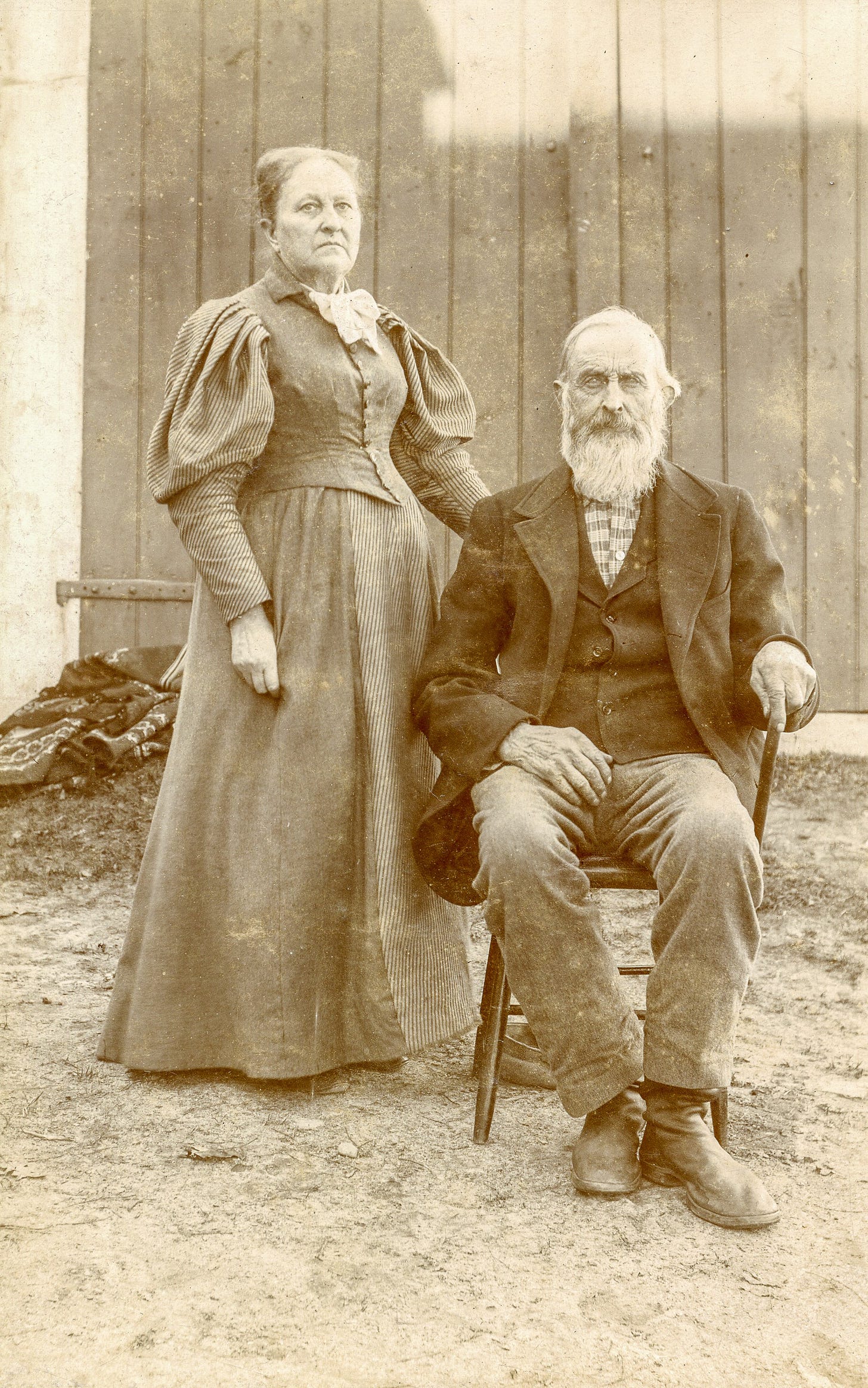 Standing woman and seated man in 1896