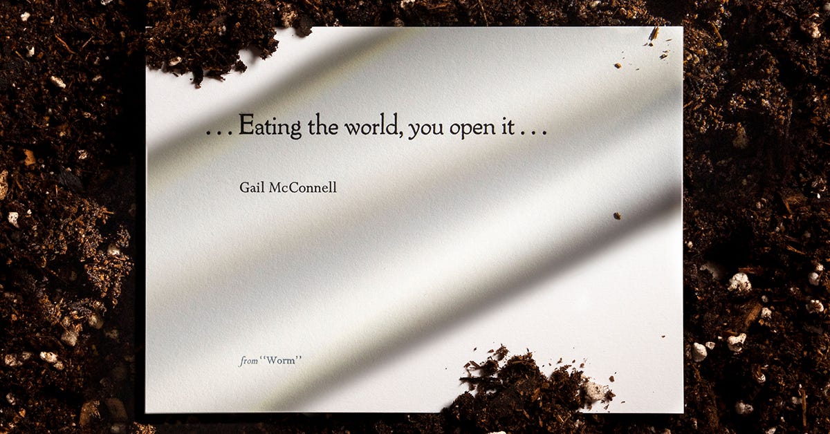 Card surrounded by soil, with quote excerpt "...Eating the world, you open it..." by Gail McConnell