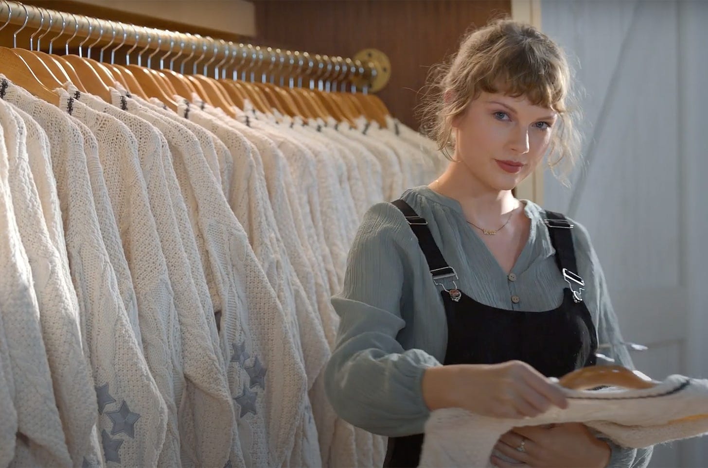 Taylor Swift Shows Off Closet Full of 'Folklore' Cardigans in New Capital  One Ad | Billboard