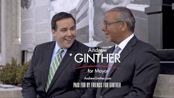 a picture from a campaign ad featuring Mayor Andrew Ginther and Former Mayor Mike Coleman