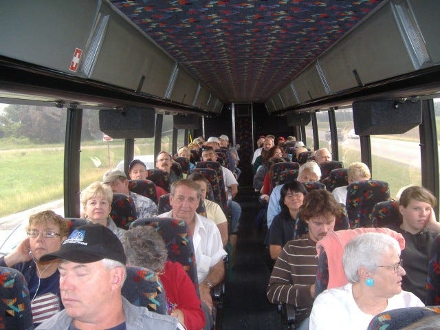 As you can tell by this shot I took on the way, the bus was pretty full of people. We had one empty seat on my bus so AFP's effort was certainly a success.