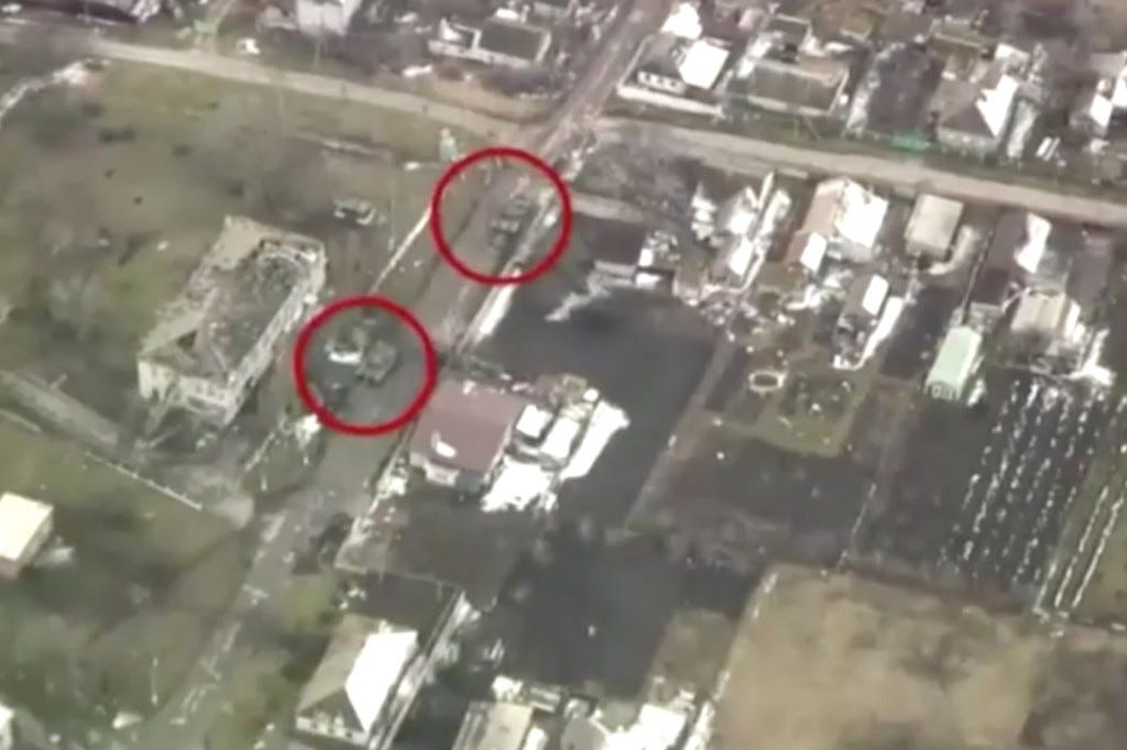 Military vehicles seen in Mariupol aerials released by Ukraine military.