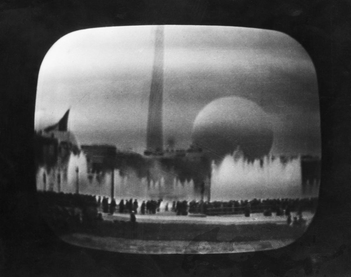 April 30, 1939, New York City: This is the scene viewed on the television receivers in the metropolitan area, as the National Broadcasting Company inaugurated the first regular television service to the American public telecasting the ceremonies marking the opening of the New York World's Fair. Later, viewers heard and saw President Roosevelt proclaim the fair open.