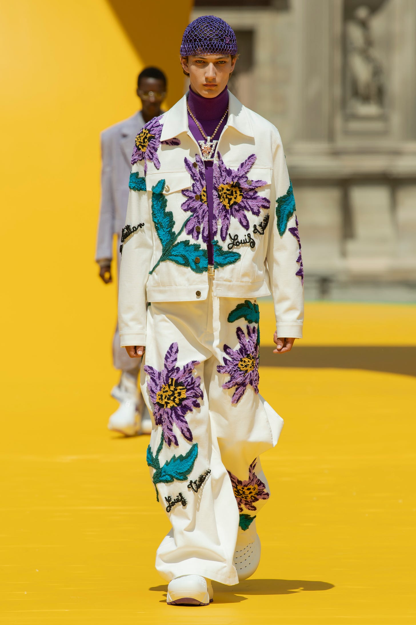 Model walking for Louis Vuitton SS23 menswear show
