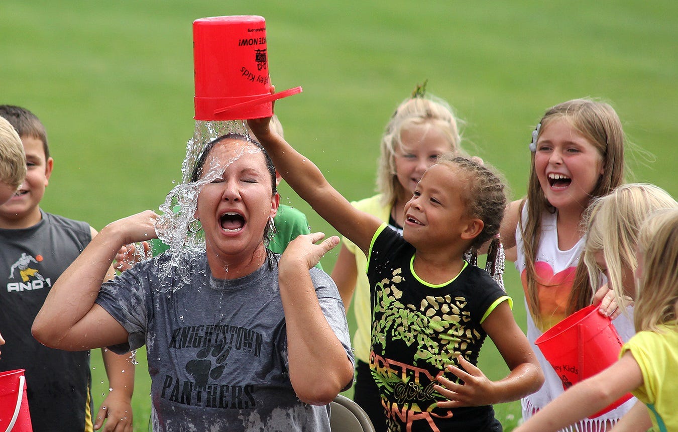 The Ice Bucket Challenge was a huge fad a few years back. Knightstown Elementary School Prinicipal Danielle Carmichael took the opportunity to raise funds for a student project. To the delight of her young students, Carmichael graciously and humorously allowed them to dump buckets of water over her and other teachers’ and staff’s heads.