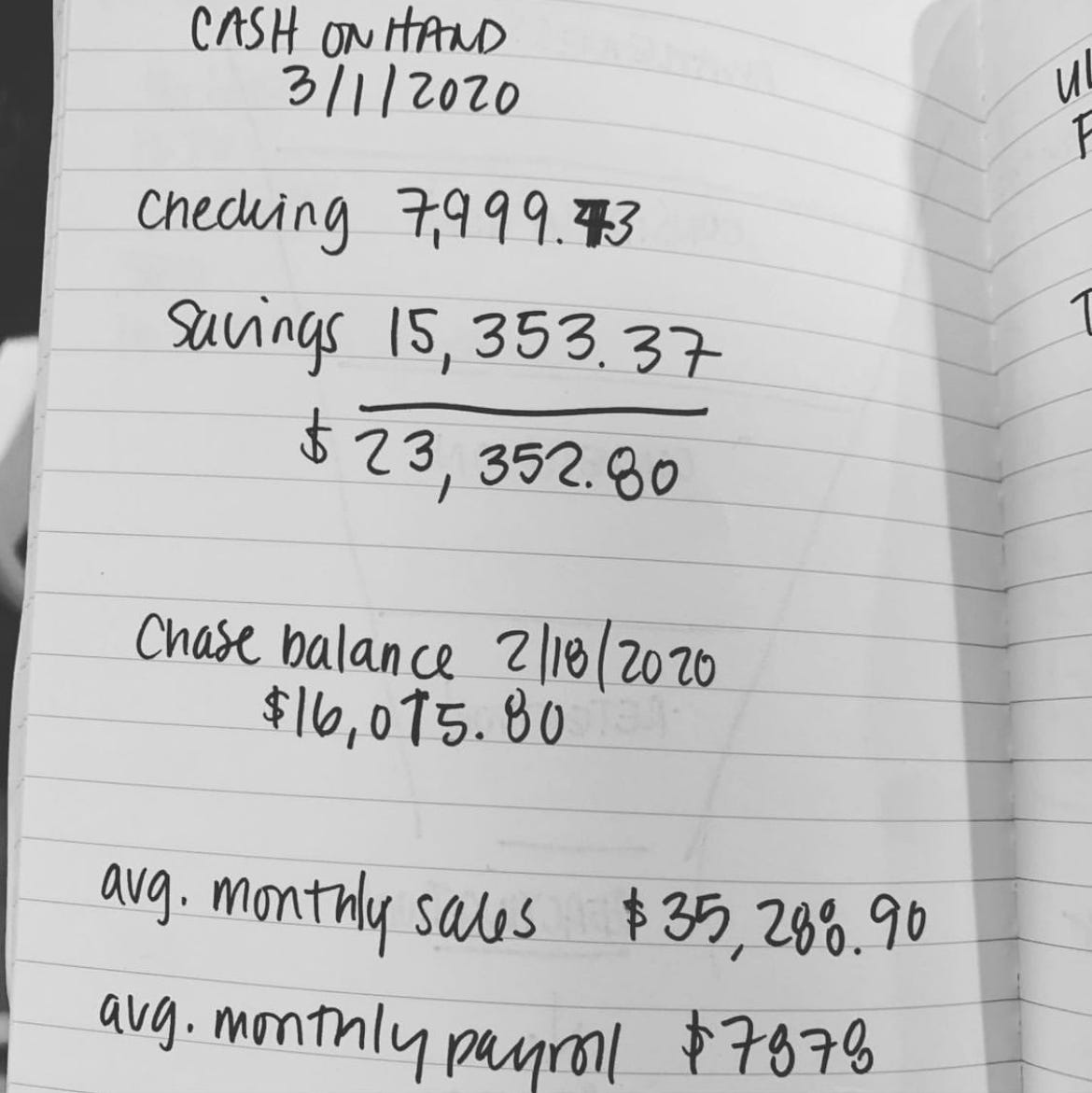 handwritten notes on lined paper with bank account numbers