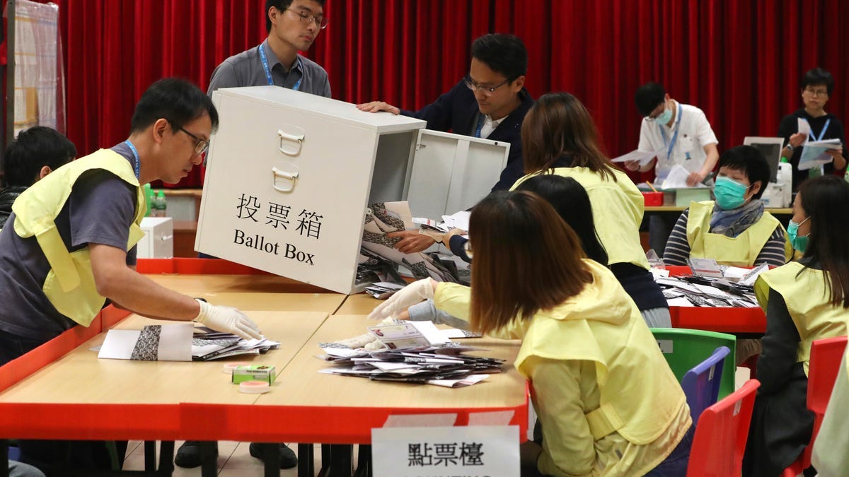 Hong Kong elections: Pro-democracy candidates gain amid record turnout
