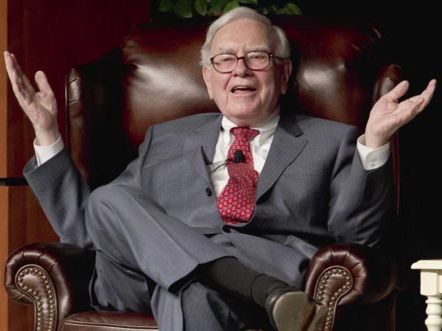 Warren Buffett in a leather chair