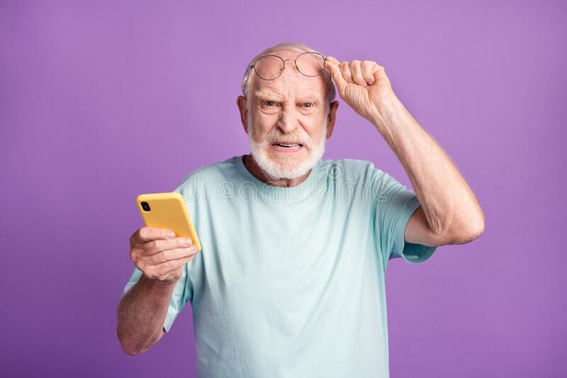 Photo Portrait of Cranky Old Man Lifting Up Glasses Holding Phone in One  Hand Isolated on Vivid Violet Colored Stock Image - Image of model, elderly:  201914993