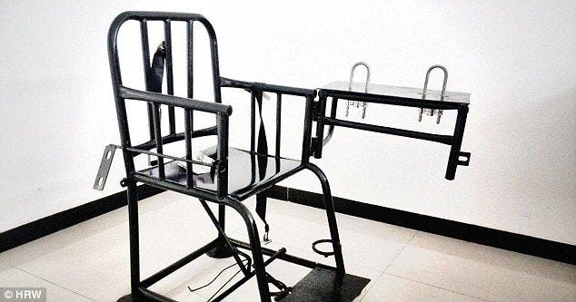 China claims its torture chair is very comfortable and doesn't inflict pain | Daily Mail Online