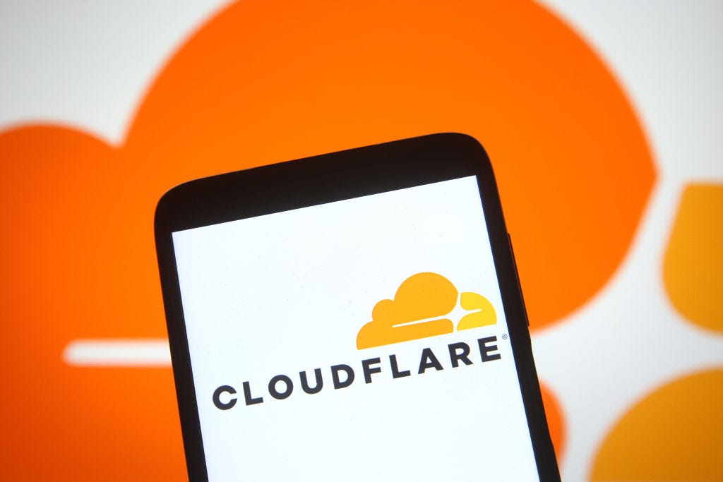 In this photo illustration, Cloudflare logo of an US internet company is seen on a smartphone screen. (Pavlo Goncha / Getty Images)