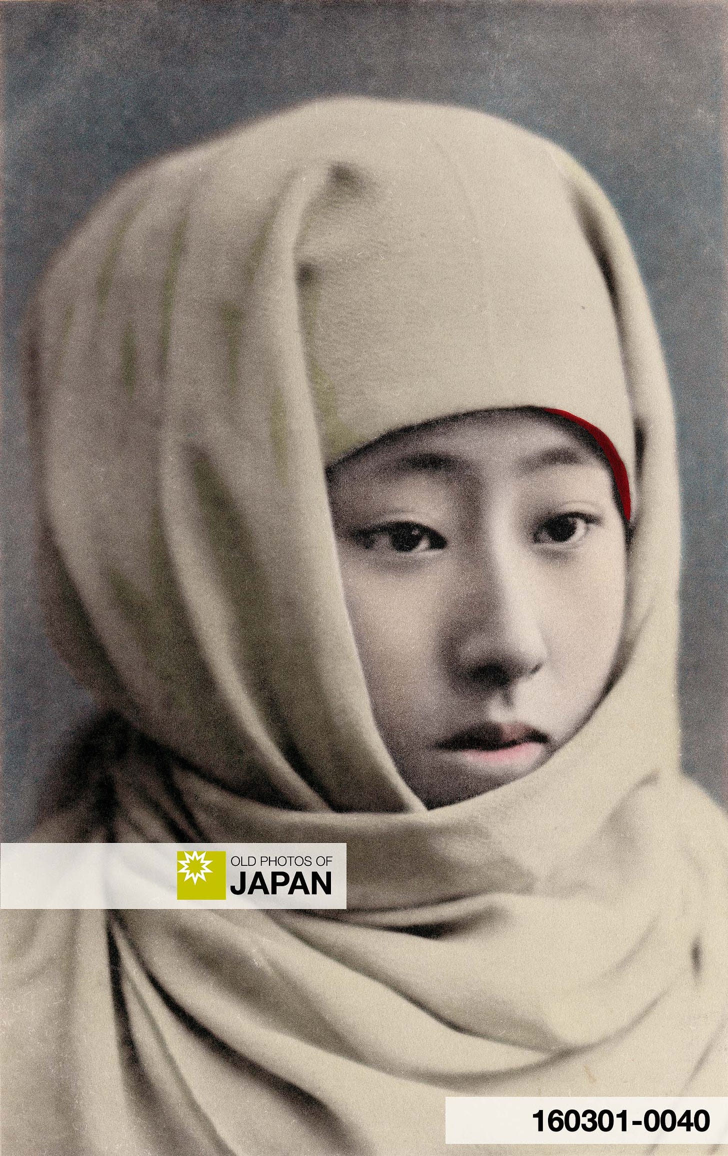 160301-0040 - Japanese Woman with Okosozukin, 1900s