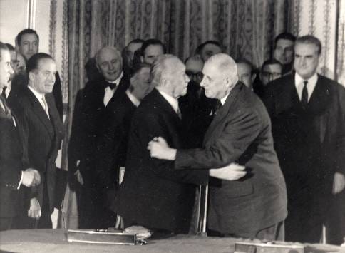 Adenauer and de Gaulle -- an inconceivable embrace.