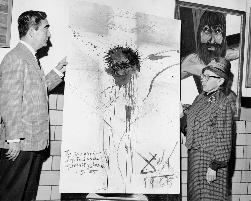 Nico Yperifanos, Salvador Dali's personal representative, presents artist's 'Christ on the Cross" to Rikers Island prison. Correction Commissiojner Anna Kross accepts the work. The Dali painting was stolen by prison guards in 2003. (Photo by Leonard Detrick/NY Daily News Archive via Getty Images)