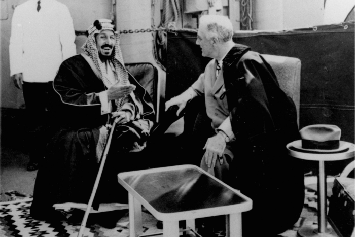 President Franklin Roosevelt and King Abdul Aziz Ibn Saud discuss Saudi-US relations aboard USS Quincy in the Great Bitter Lake north of the city of Suez in 1945