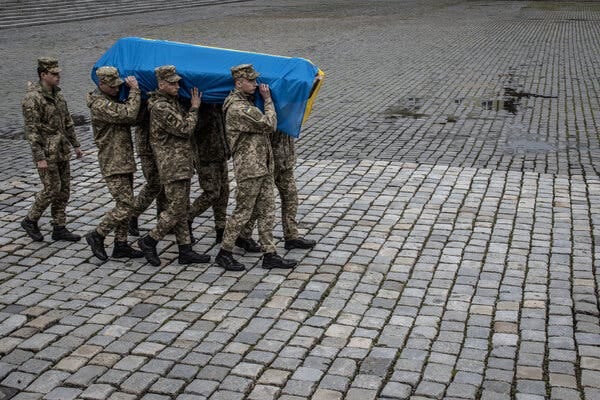 The funeral for Ehor Kihitov, a Ukrainian soldier who was killed in an artillery strike, in Lviv on Tuesday.