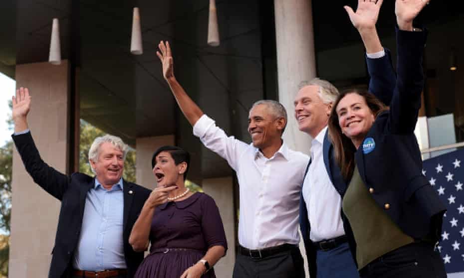 Barack Obama campaigns with Terry McAuliffe, second from right. 