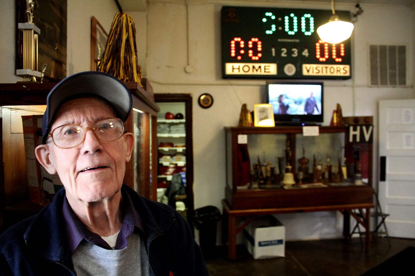 Knightstown native Bill Sitler is one of the few remaining citizens who actually played ball in the gym as a high school student. Sitler has been an active Hoosier Gym volunteer for decades, having served as treasurer, tour guide and general goodwill ambassador. Present when Hoosiers Director David Anspaugh visited, Sitler told him how he’d played ball in the gym as a youngster. That brief story was enough to move Anspaugh to tears, overcome apparently by the nostalgia. Here, Sitler is show in the Hoosier Gym foyer.