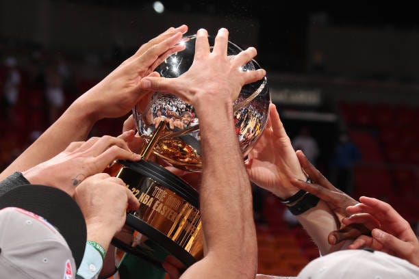 The Boston Celtics celebrate with the Bob Cousy Eastern Conference Championship Trophy after Game 7 of the 2022 NBA Playoffs Eastern Conference...