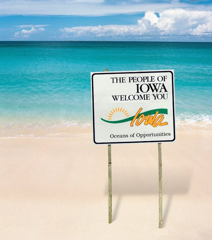 Welcome to Iowa sign on an ocean beach
