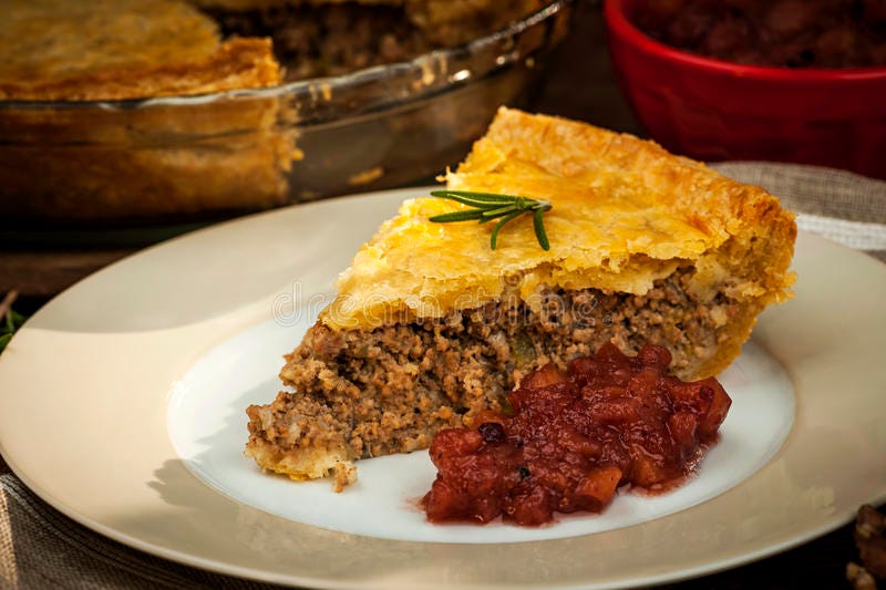 Slice of meat pie Tourtiere stock photos
