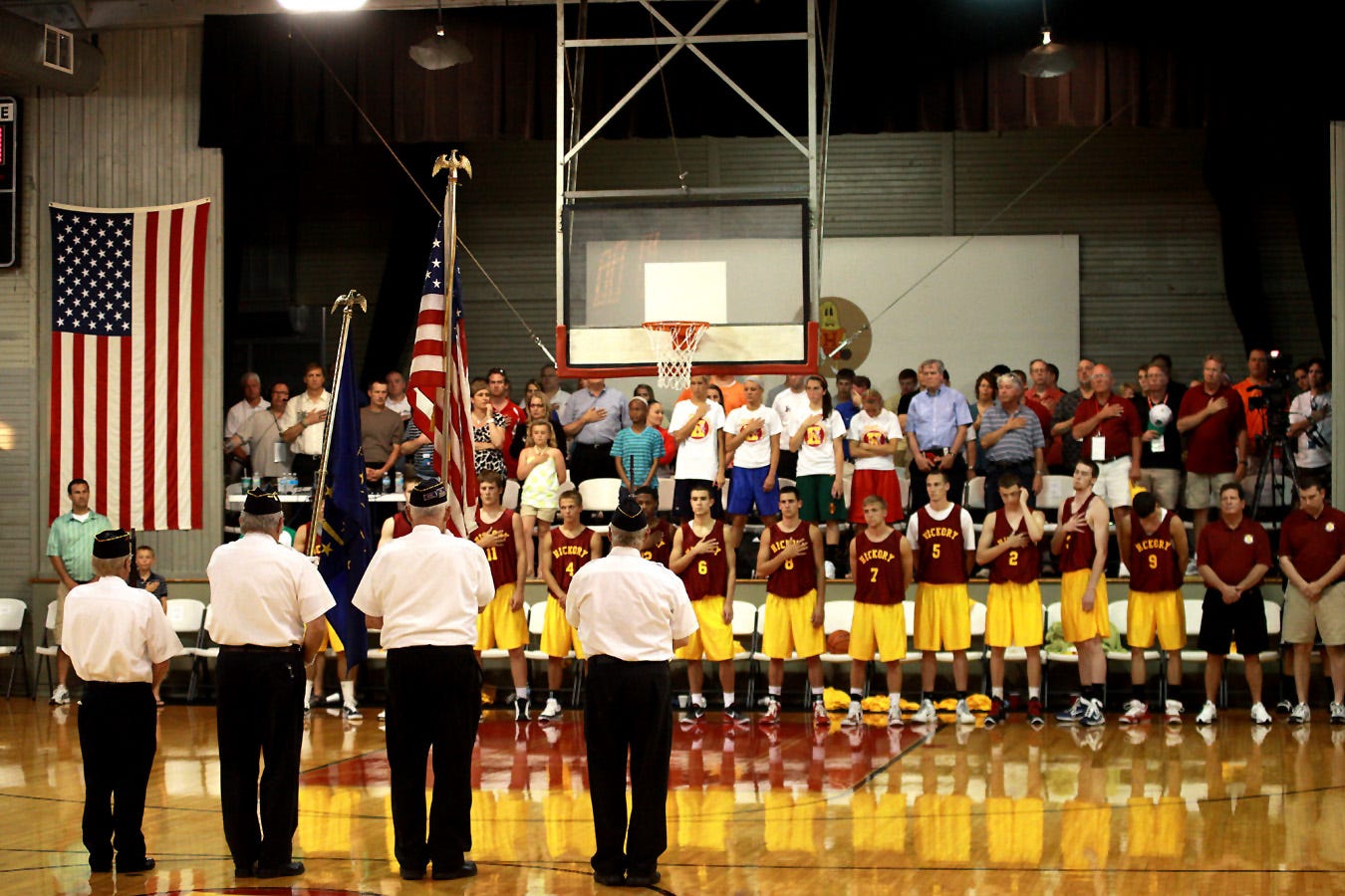 The Knightstown American Legion Post 152 Honor Guard presents the colors prior to tip-off at the 2011 Hoosiers Reunion All-Star Classic Doubleheader. Located on Main Street (U.S. 40) in Knightstown, American Legion Post 152 is one of few area posts to offer honor guard services at ball games and veteran funerals.