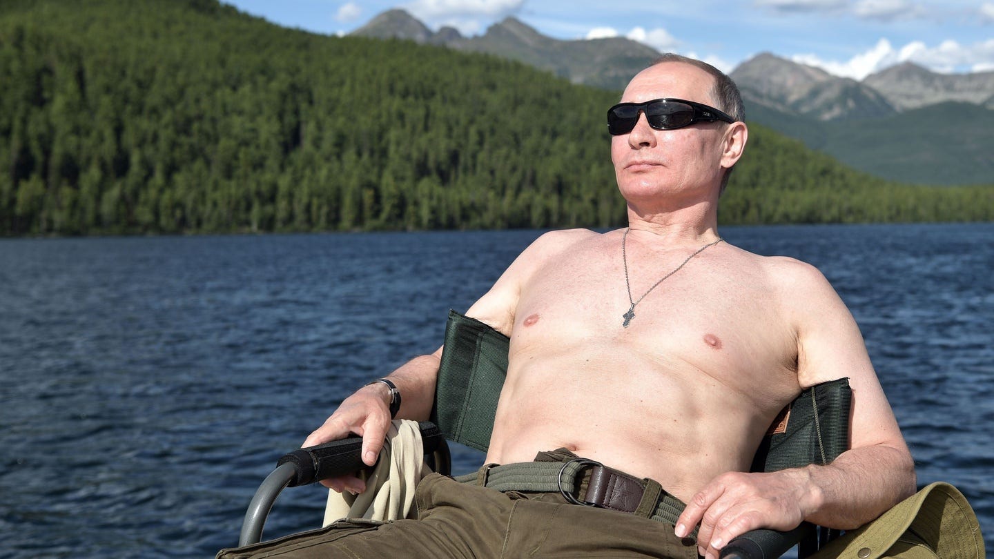 Siberian suntan: bare-chested Vladimir Putin goes fishing
