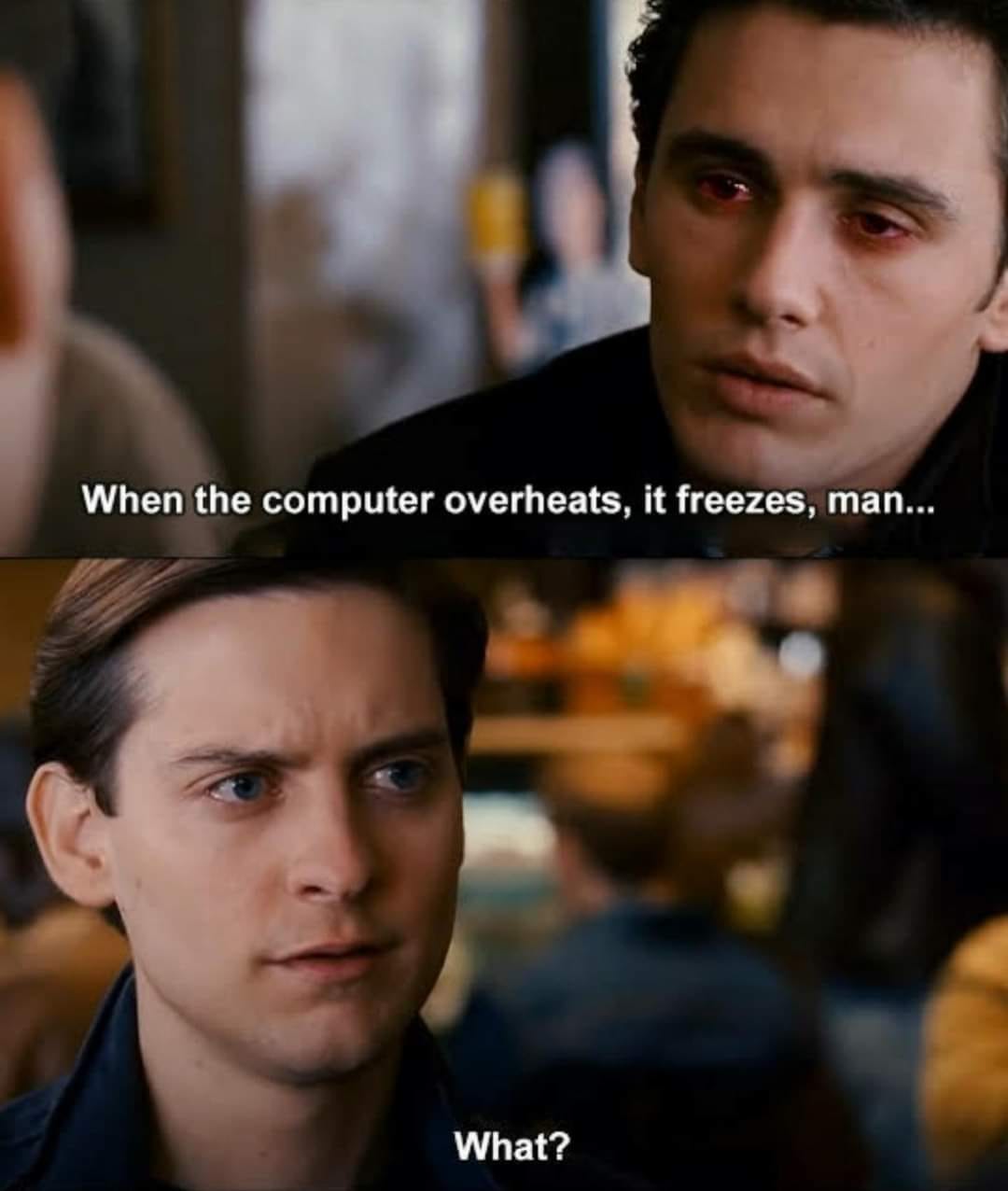 May be an image of 2 people and text that says 'When the computer overheats, it freezes, man... What?'