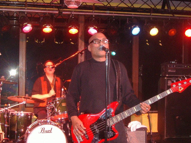 Severo handling the vocals on one of the three Beatles covers the group played.