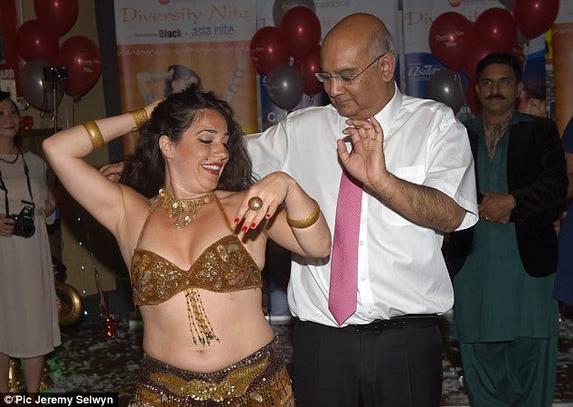 He was photographed dancing with a belly dancer at the Labour Party 'diversity' night in Brighton