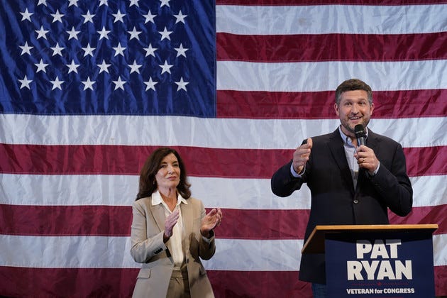 Democratic candidate Pat Ryan, right, and New York Gov. Kathy Hochul appear on stage together during a campaign rally for Ryan, Monday, Aug. 22, 2022, in Kingston, N.Y. 