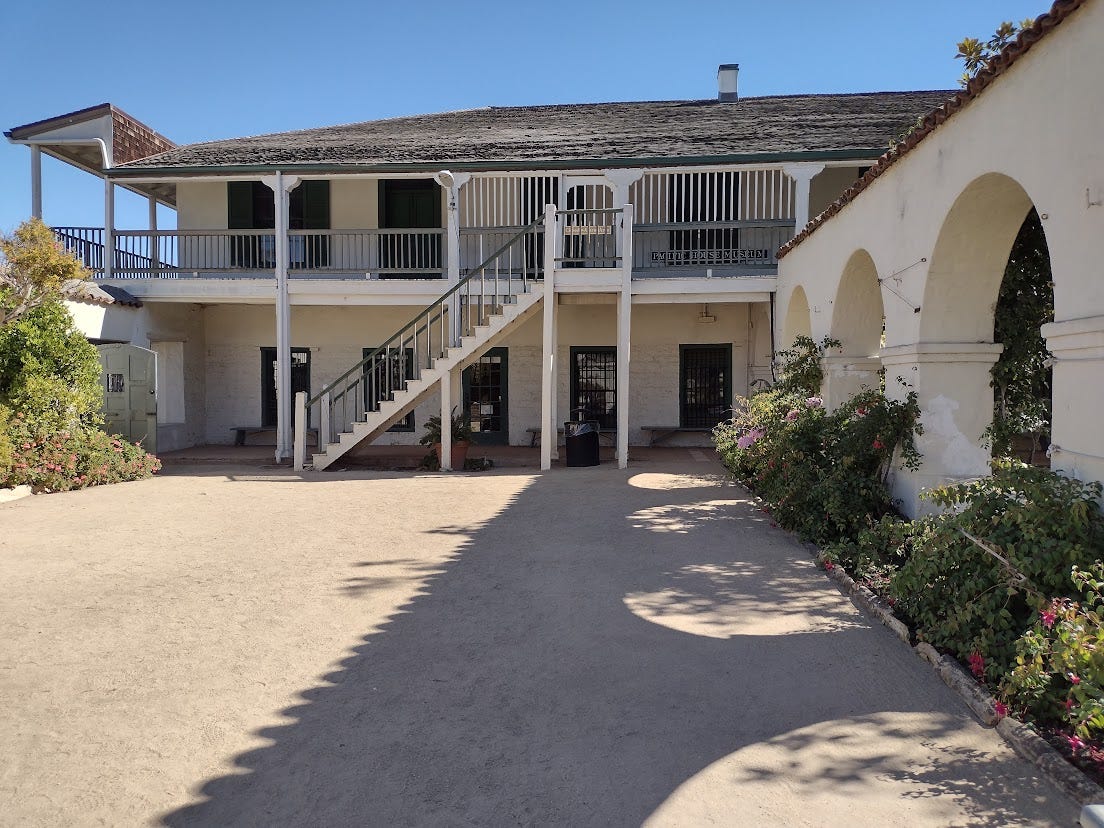 Two story adobe building