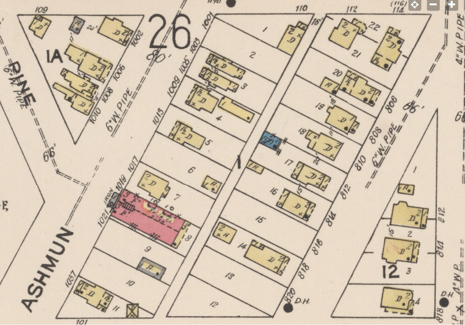 Clip of 1922 map showing streets, building lots, and buildings.