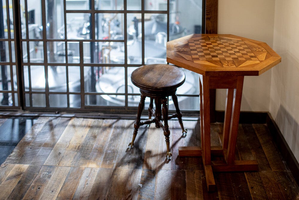 Detail inside the Abbey at Bold Monk Brewing Co. The octagonal table can be used for chess or some other games.