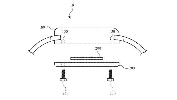 An example of using bolts to hold an Apple Watch module to the back of the device