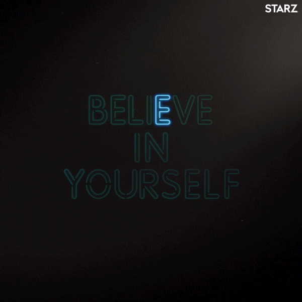 "Believe in yourself" in neon lights.