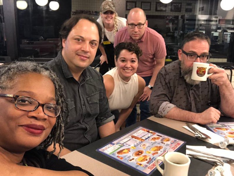 Picture of people eating at the waffle house. Includes lisa welchman and mike monteiro who are mentioned in this piece