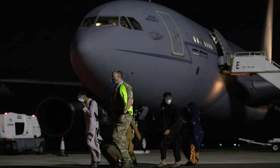 Evacuees arrive at RAF Brize Norton  from Afghanistan in August 2021