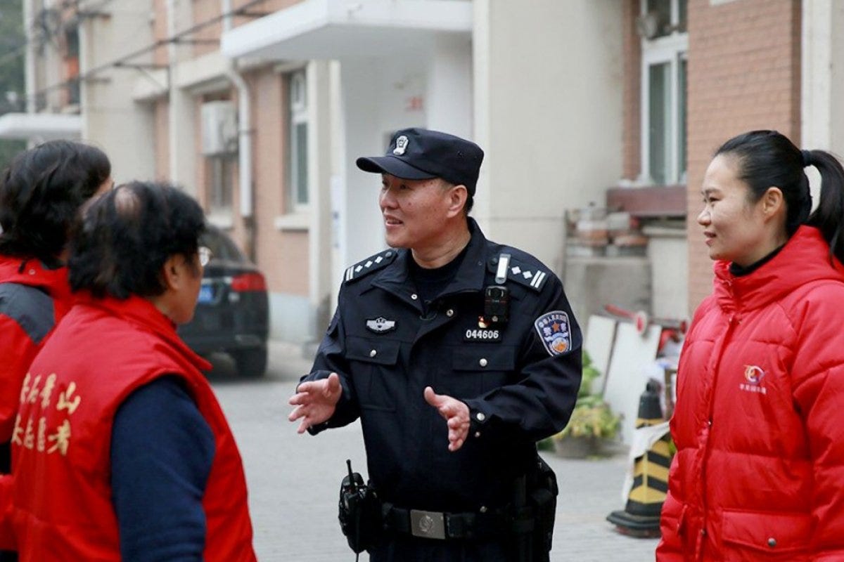 By July, every village and residential community in Beijing will have a community police officer doubling as its deputy party chief. Photo: Qianlong.com