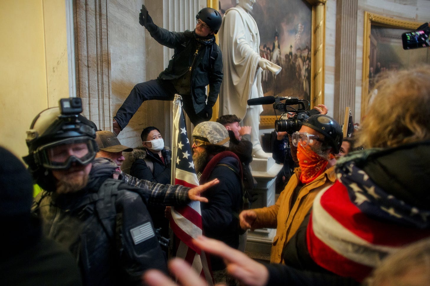 Pro-Trump protesters storm the U.S. Capitol to contest the certification of the 2020 U.S. presidential election results by the U.S. Congress, at the U.S. Capitol Building in Washington, D.C., U.S. January 6, 2021. Picture taken January 6, 2021. REUTERS/Ahmed Gaber - RC263L9P157M